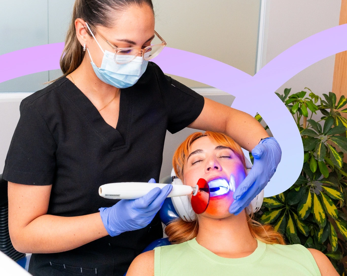 Dentist treating a patient with a tooth-colored composite filling at hisonrisa.