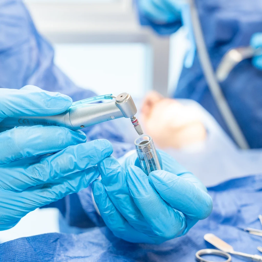 Sterile implant driver prepared for implant surgery.